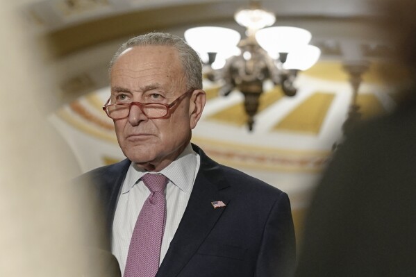Senate Majority Leader Chuck Schumer of D-N.Y., speaks to reporters following a closed-door caucus meeting about preventing a government shutdown, at the Capitol in Washington, Wednesday, Sept. 27, 2023. (AP Photo/Mariam Zuhaib)